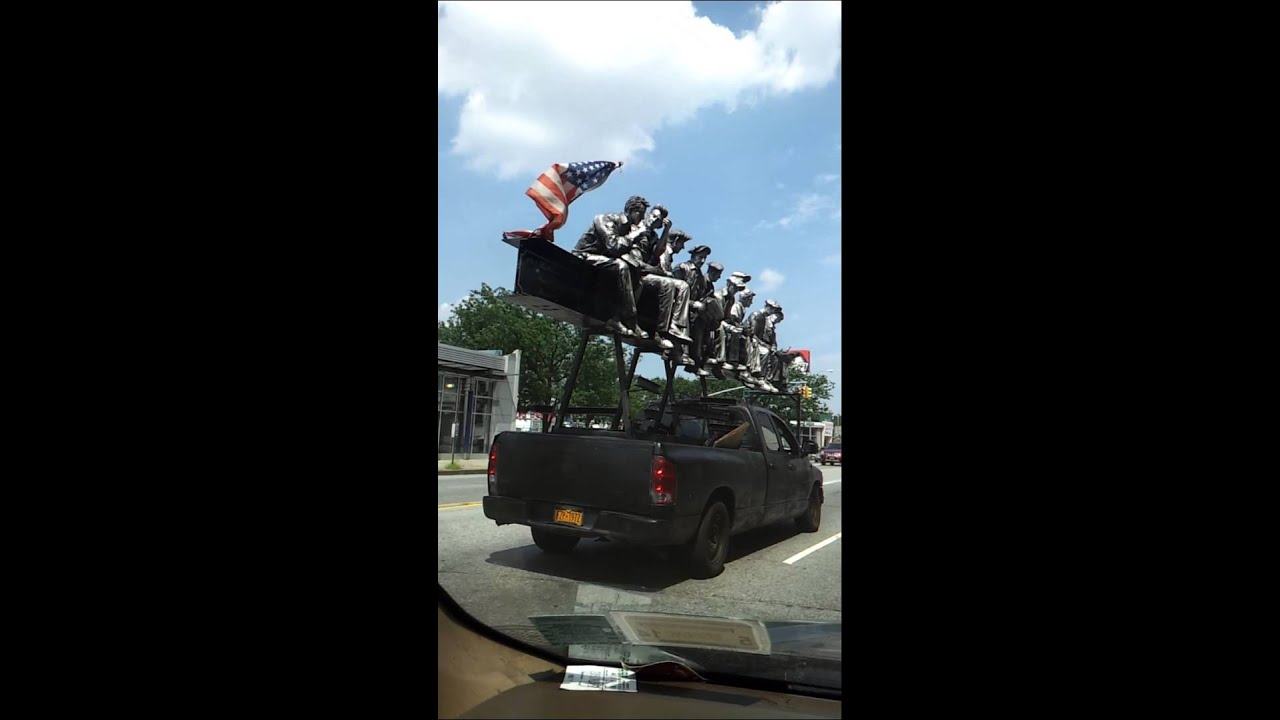 Statue of soldier seem like coming from war