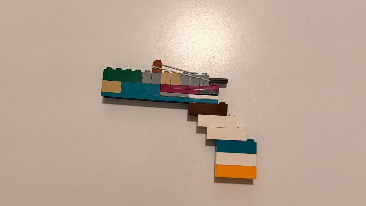 Пістолет з Лего та резинки