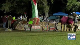 Pro-Palestinian protesters fortify barricade as Tulane University warns of trespassing consequenc...