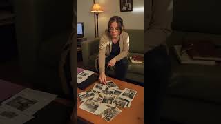 the tv flickers with static. the photos on the table are all the same face. different angles, same r the tv flickers with static. the photos on the table are all the same face. different angles, same r
