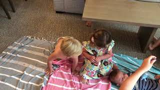 Boy accidentally kicks girl on face as he attempts to roll over