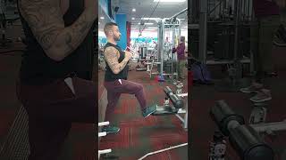 standing split stance cable lat pulls with vbar