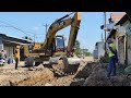 The excavator is unloading rocks.