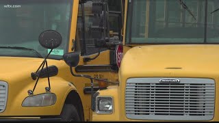 School bus drivers to get pay raise in new budget