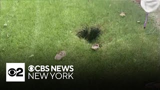Details Long Island woman plunges into backyard hole Update