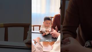 Dad will take a two-year-old baby with him every time he meets a customer.
