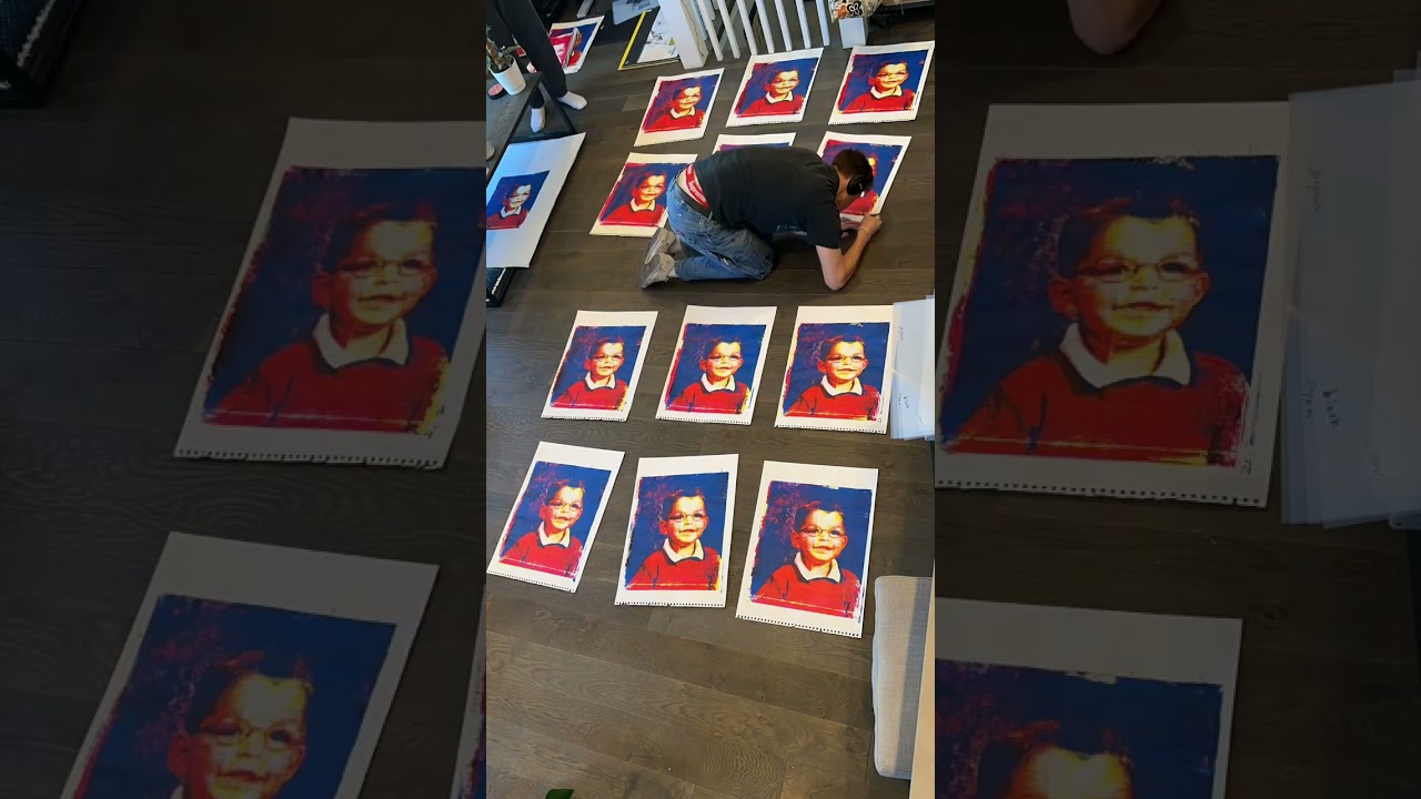 Matthew Moloney silkscreen prints being signed and numbered.