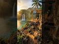 This cabin is built INTO the waterfall cliff #incredible #design
