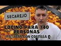 Como cocinar patatas con costilla para un pueblo entero 