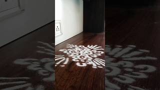 Simple yet stunning 🤍✨ rangoli magic!