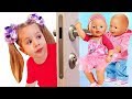 Diana and crying Baby Born dolls behind the door