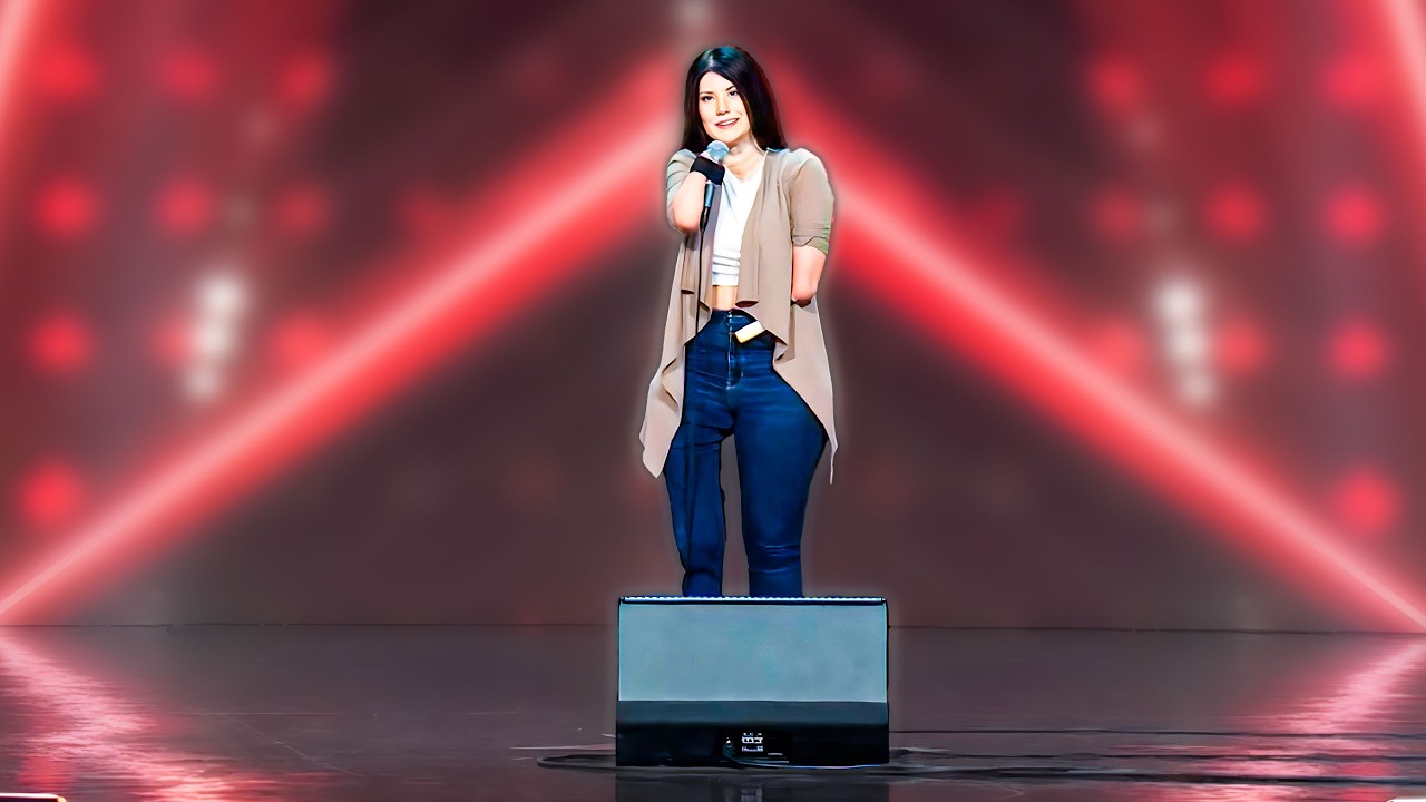 She Has the Microphone Strapped to Her Arm – Then Proceeds to Make Jokes About Hands! – Video