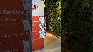 Free cute postcards and green leaves picture wall at Markthal | Free things to do in Rotterdam
