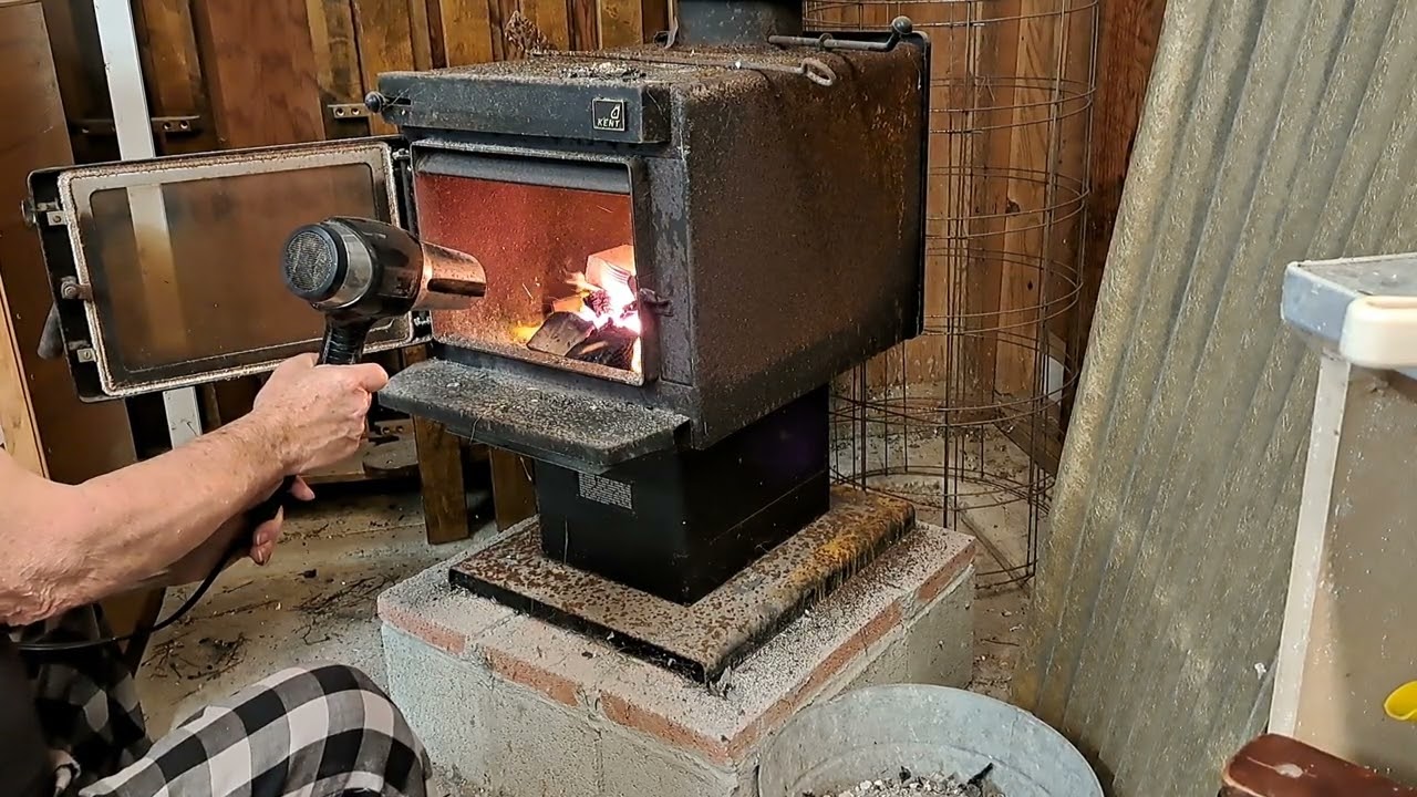 Starting a fire in a wood shop stove
