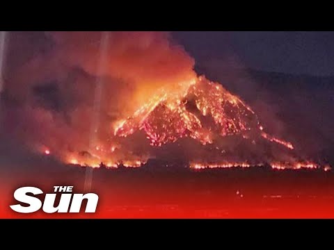 Huge wildfire lights up mountain in Thailand in towering inferno