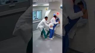 Doctor Rushes In As Nurse Gets Stuck In Mri Machine Cctv View