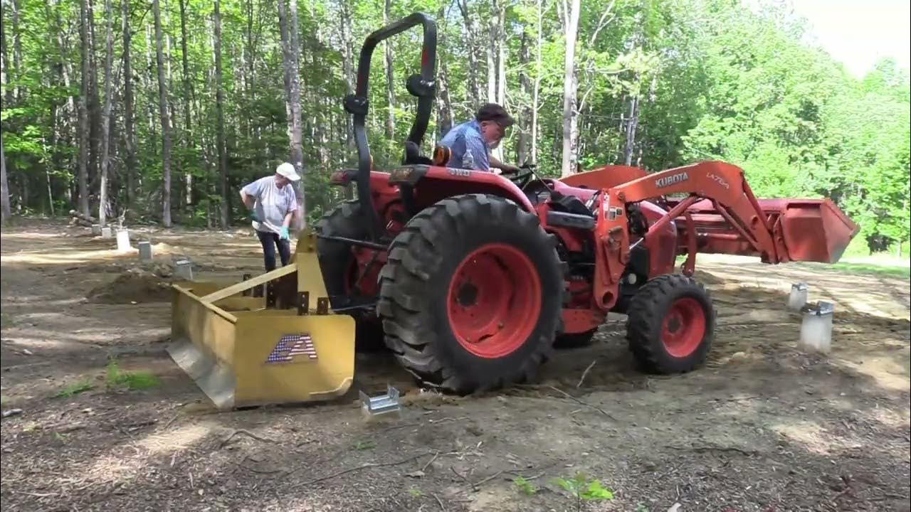 200 Piers vs sonotubes are installed smoothing out ground with