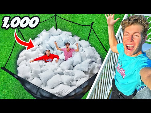 TRAMPOLINE FILLED WITH 1,000 PILLOWS! class=