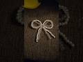 DIY bow bag charm. #bagcharm #bow #aesthetic #pinteresty #pinterest #pearl #diy #craftbuttons