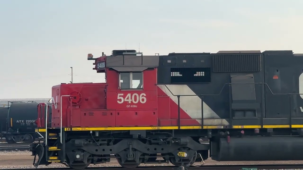 CN sd60/sd40-2w duo connects to cut of cars at CN Walker yard