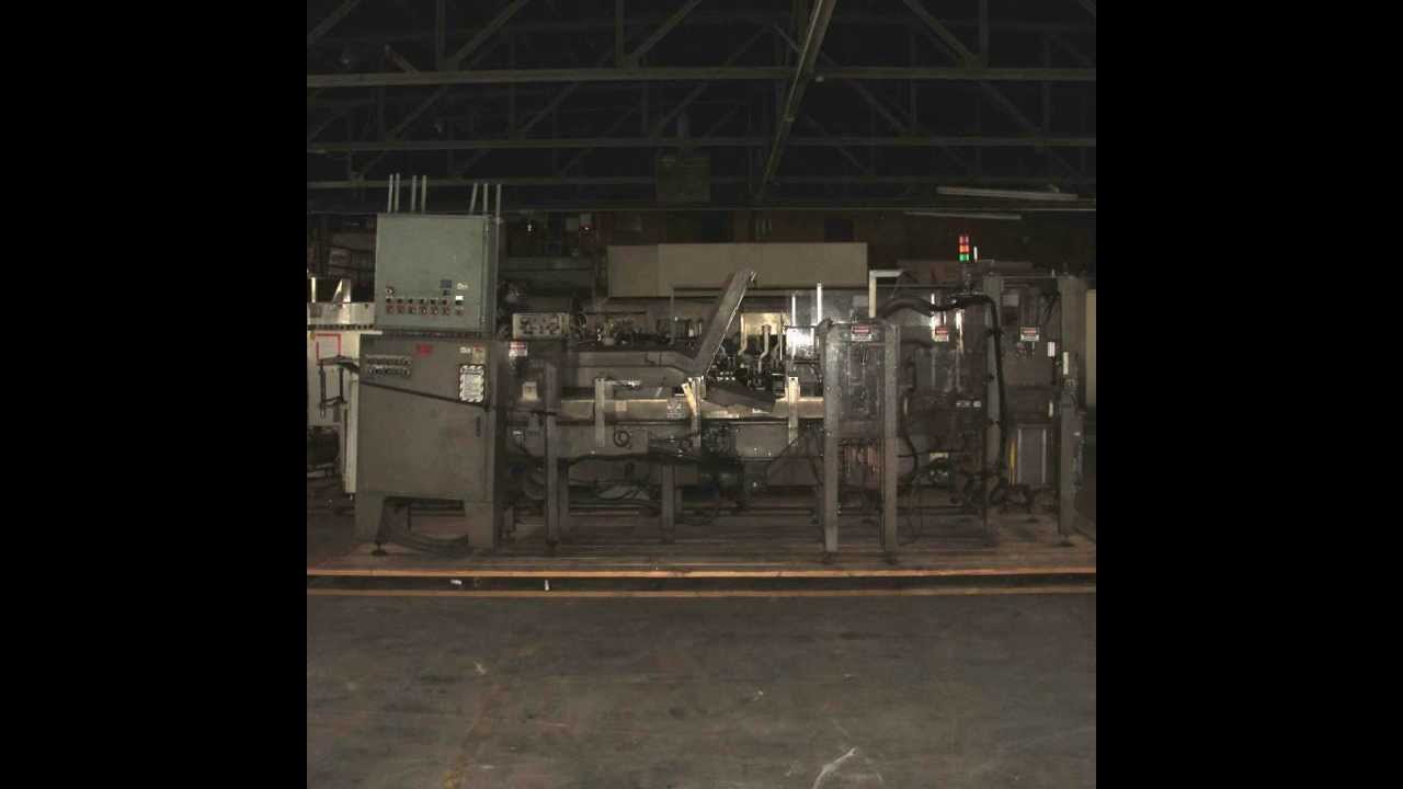 SV Dice Designers Packaging Machinery model 127WA automatic WrapAround