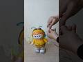try to make dancing doll found in pile of mini fans and old toys