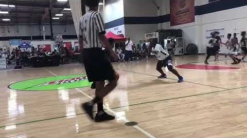 Matthew Wilson shakes off defender at Cavs Classic Tournament