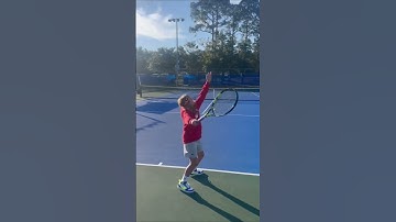 Watch 8 year old Lane SERVE!!! Rick Macci style!
