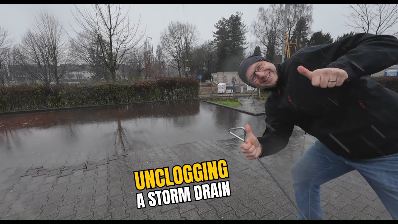 #053-2 Unclogging a storm drain during rain in Germany - YouTube