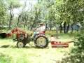 Clearing brush with tractor
