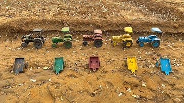 Loading of soil in tractor trolley with shovel#60