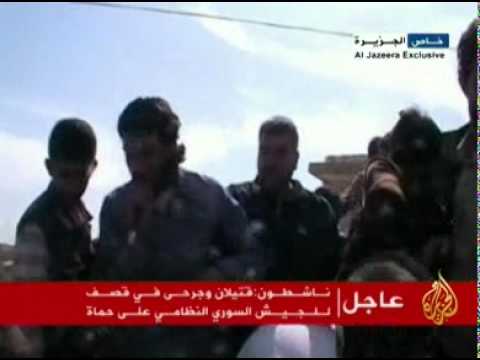 متظاهرون يرددون شعارت تطالب بتسليح الجيش الحر