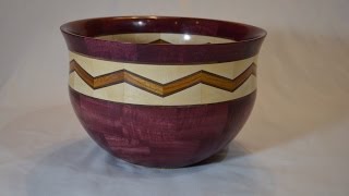 This piece is available for purchase at http://www.fiaschettiwoodworking.com/ This is a segmented bowl made out of Purpleheart, 