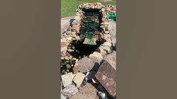 Blue water to find the leak in our water feature.