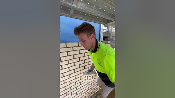 Laying bricks on scaffold #asmr #bricklayer #shorts