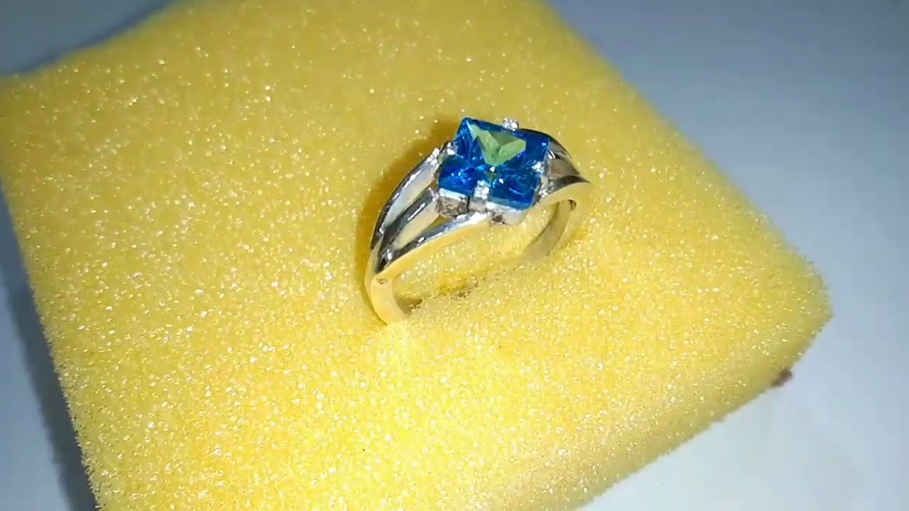 Handcrafting a Sleek Silver Ring That Shines With a Aqua Blue Gemstone 