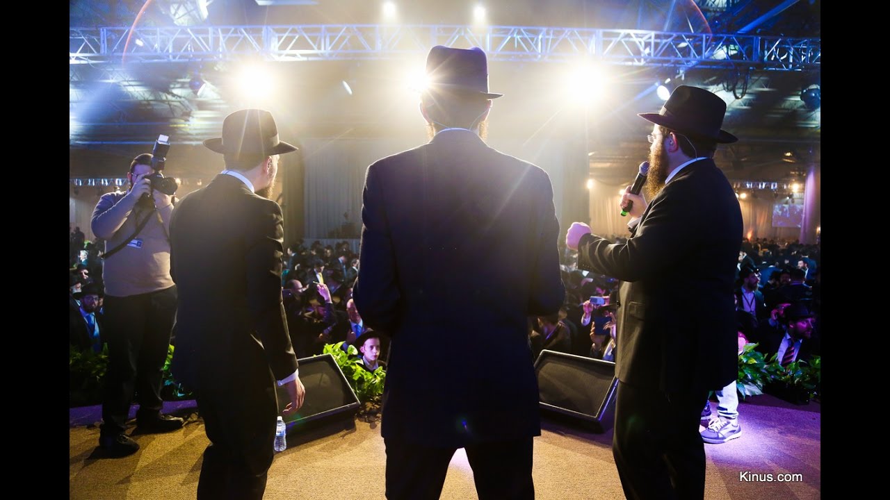 newspaper mockup Thousands of Hassidim Dance at the end of Kinus 5777