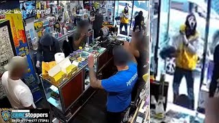 Armed suspect in 'Scream' mask holds up smoke shop in Queens