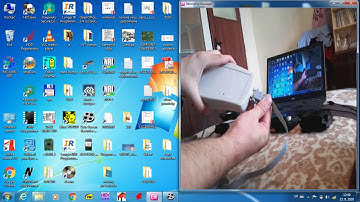 How does the programming box for NRI coin validators work.