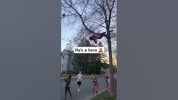 Kid climbs tall tree for football 🧗🏻‍♂️🌲🏈 #shorts #shortsvideo  #climbing #climb #climber