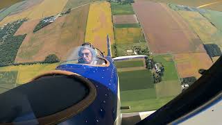 Aerobatics  in an open cockpit Great Lakes Biplane: loops rolls Immelmann