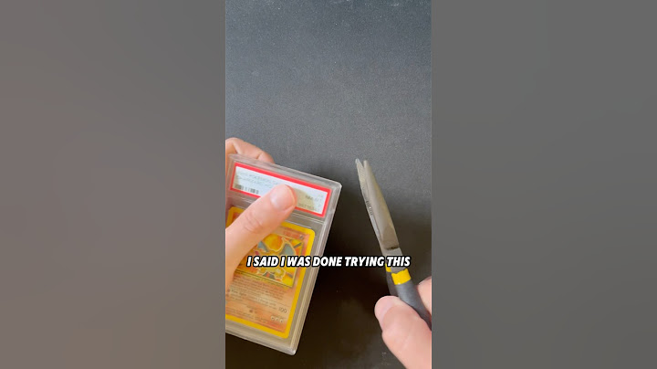 Cracking PSA Charizard Pokemon Card to Regrade at TAG