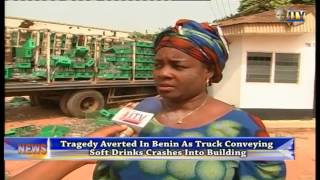 Tragedy Averted In Benin As Truck Conveying Soft Drinks Crashes Into Building screenshot 5