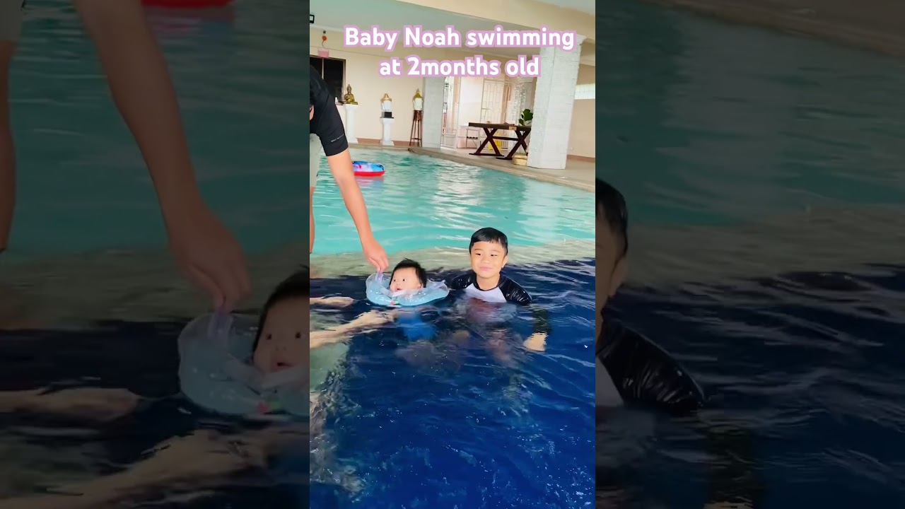 Baby Noah swimming with Neck Float
