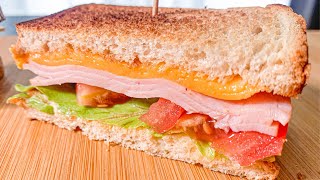 Ham And Cheese Sandwich With Lettuce And Tomato