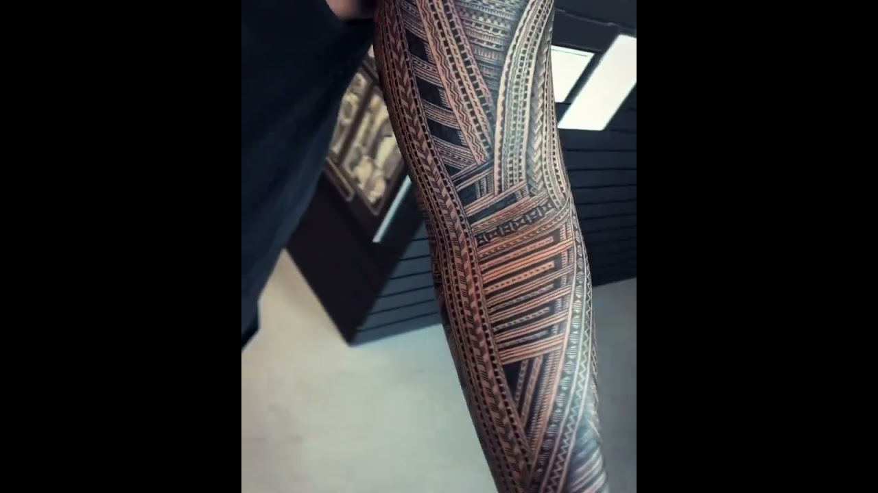 polynesian forearm tattoo