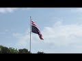Miramar Beach business flies American flag upside down