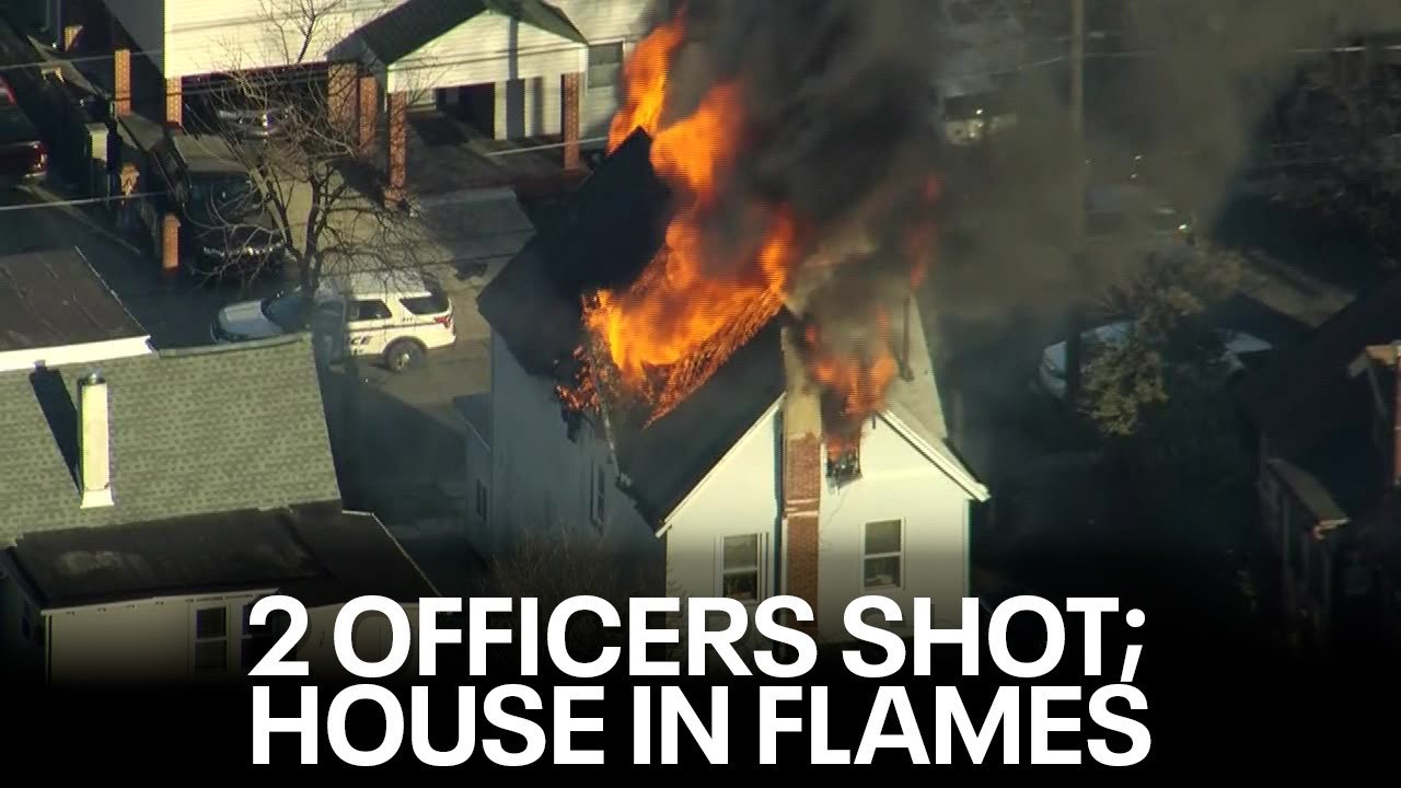 Officers shot responding to call of child shot in East Lansdowne, PA; burning home surrounded