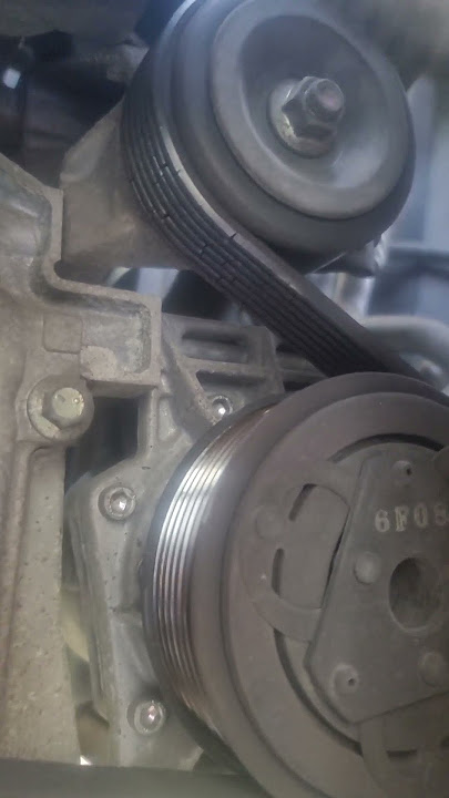 removing the serpentine belt from 2016 Nissan Note/Versa