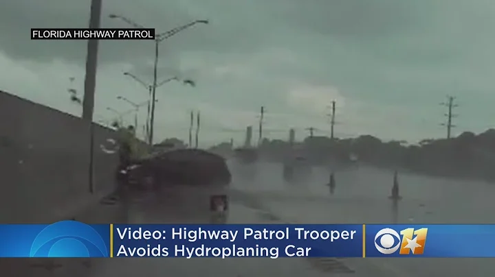Video: Highway Patrol Trooper Avoids Hydroplaning Car